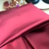 BOLSO NUDO EN ROJO VINO