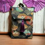 GINGO FLAP BAG WITH PURPLE TASSELS