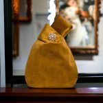 KNOT BAG IN GOLDEN VELVET FABRIC